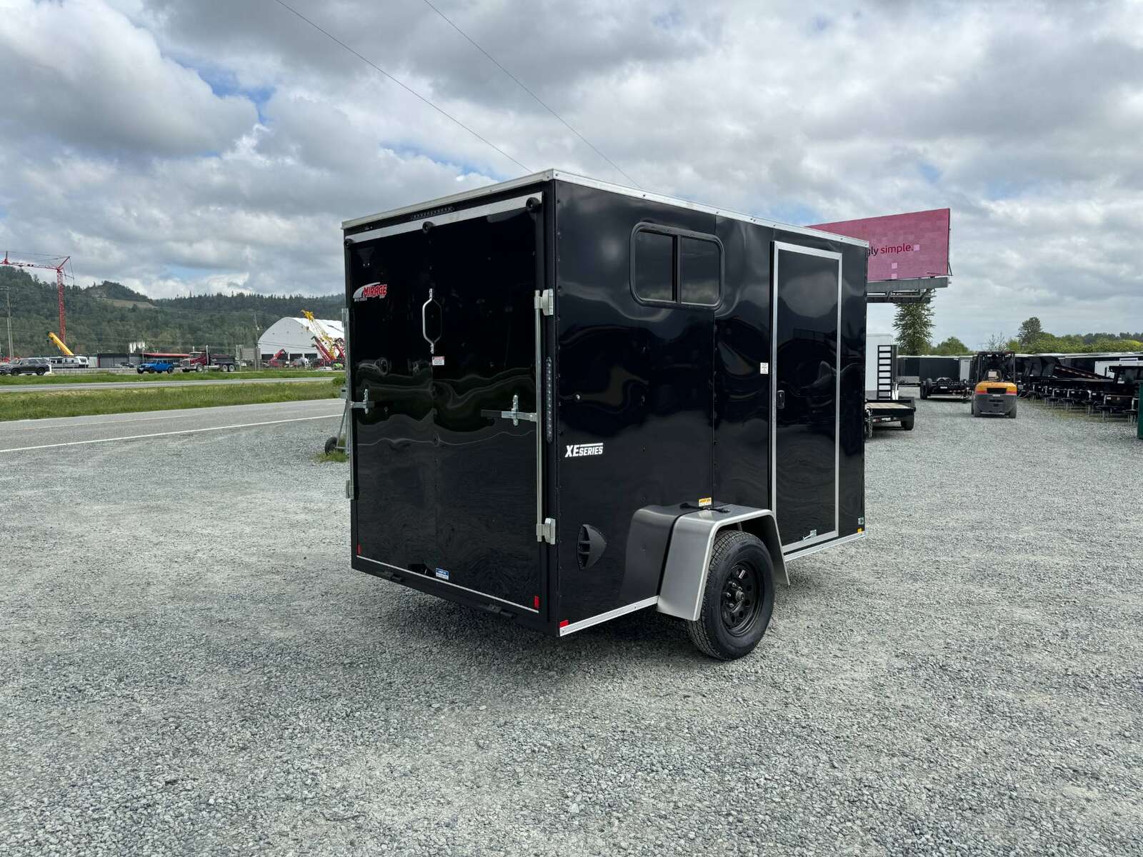 Photo of 2025 Mirage XE 6X10 CAMPING PACKAGE Cargo / Enclosed Trailer SIDE WINDOW BLACK RAMP DOOR EXTRA HEIGHT