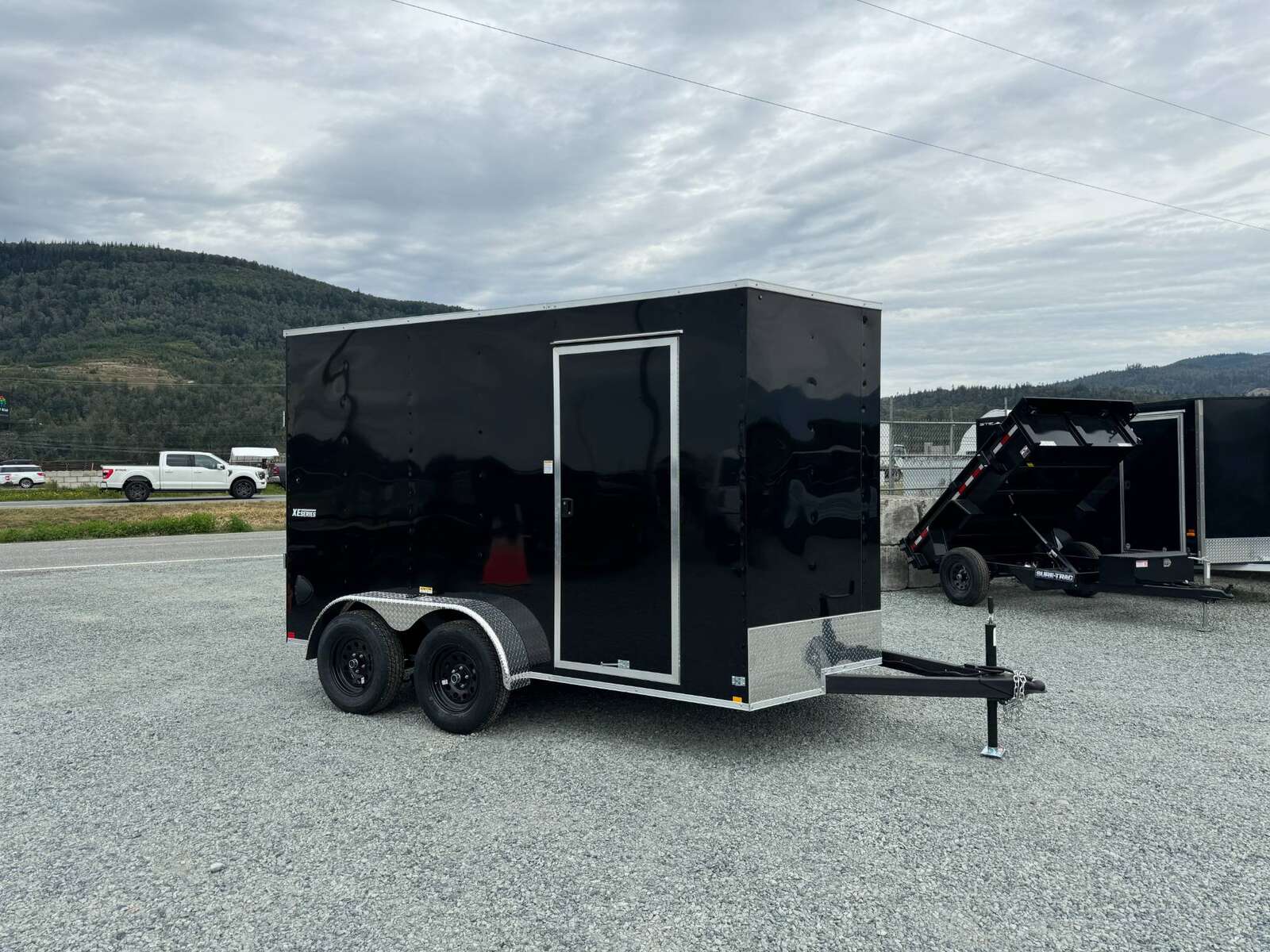 Photo of 2026 Mirage XE 7X12 V-Nose Ramp Door Cargo / Enclosed Trailer Extra Height Black 7000lb GVW