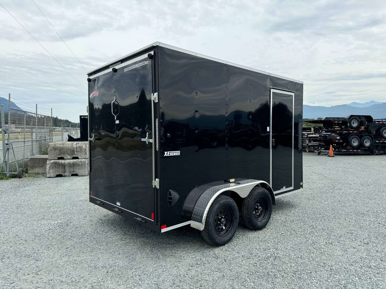 Photo of 2026 Mirage XE 7X12 V-Nose Ramp Door Cargo / Enclosed Trailer Extra Height Black 7000lb GVW
