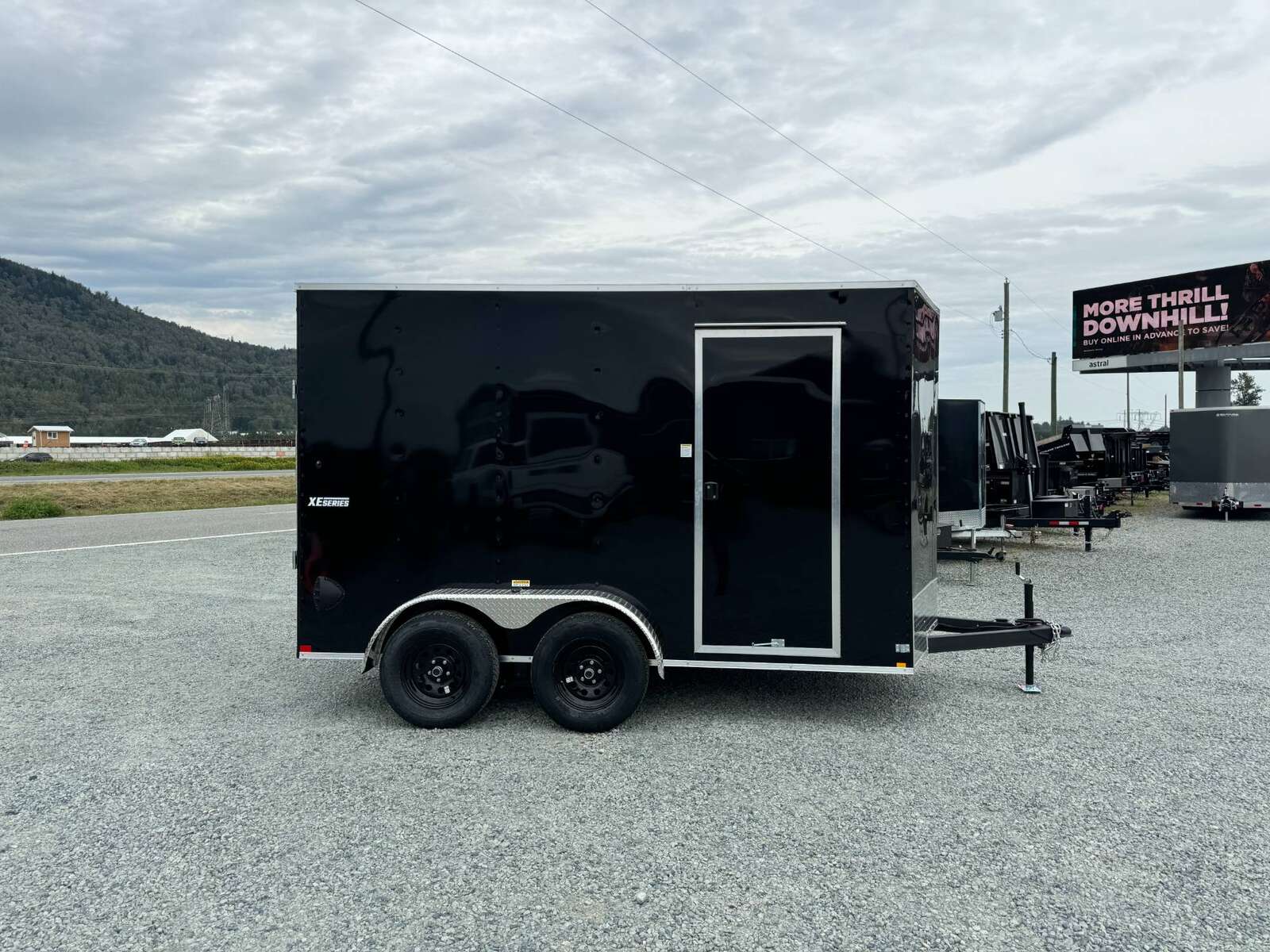 Photo of 2026 Mirage XE 7X12 V-Nose Ramp Door Cargo / Enclosed Trailer Extra Height Black 7000lb GVW