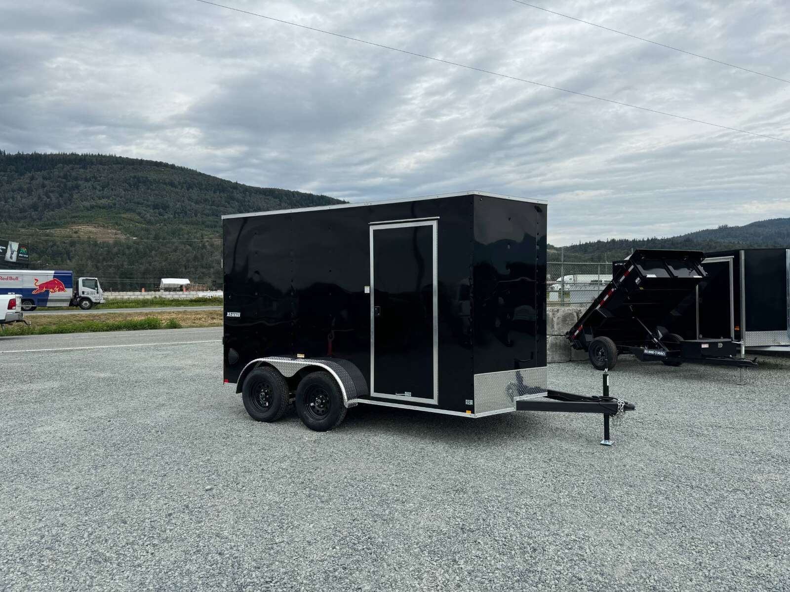 Photo of 2026 Mirage XE 7X12 V-Nose Ramp Door Cargo / Enclosed Trailer Extra Height Black 7000lb GVW