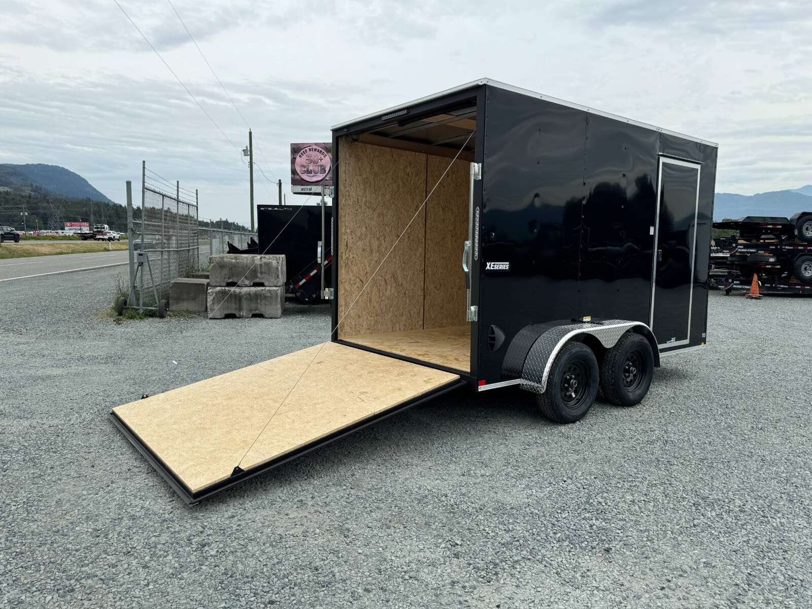 Photo of 2026 Mirage XE 7X12 V-Nose Ramp Door Cargo / Enclosed Trailer Extra Height Black 7000lb GVW