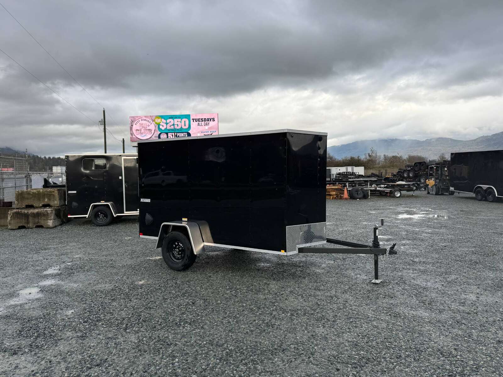 Photo of 2025 Mirage XE 5x10 V Nose Cargo / Enclosed Trailer Black Barn Door 2990lb GVW