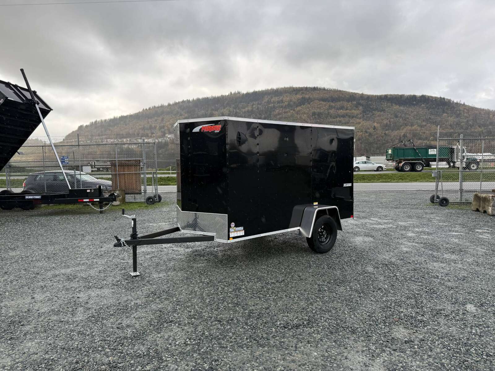 Photo of 2025 Mirage XE 5x10 V Nose Cargo / Enclosed Trailer Black Barn Door 2990lb GVW