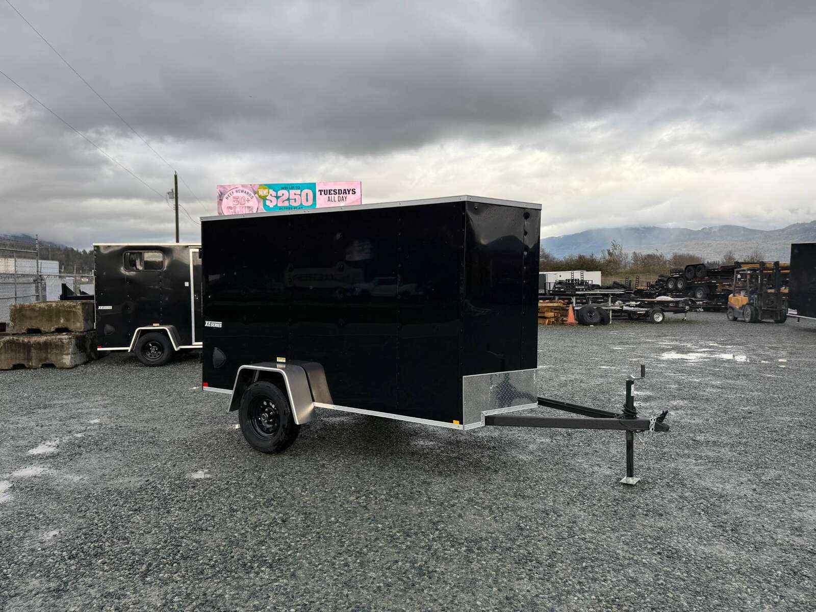 Photo of 2025 Mirage XE 5x10 V Nose Cargo / Enclosed Trailer Black Barn Door 2990lb GVW