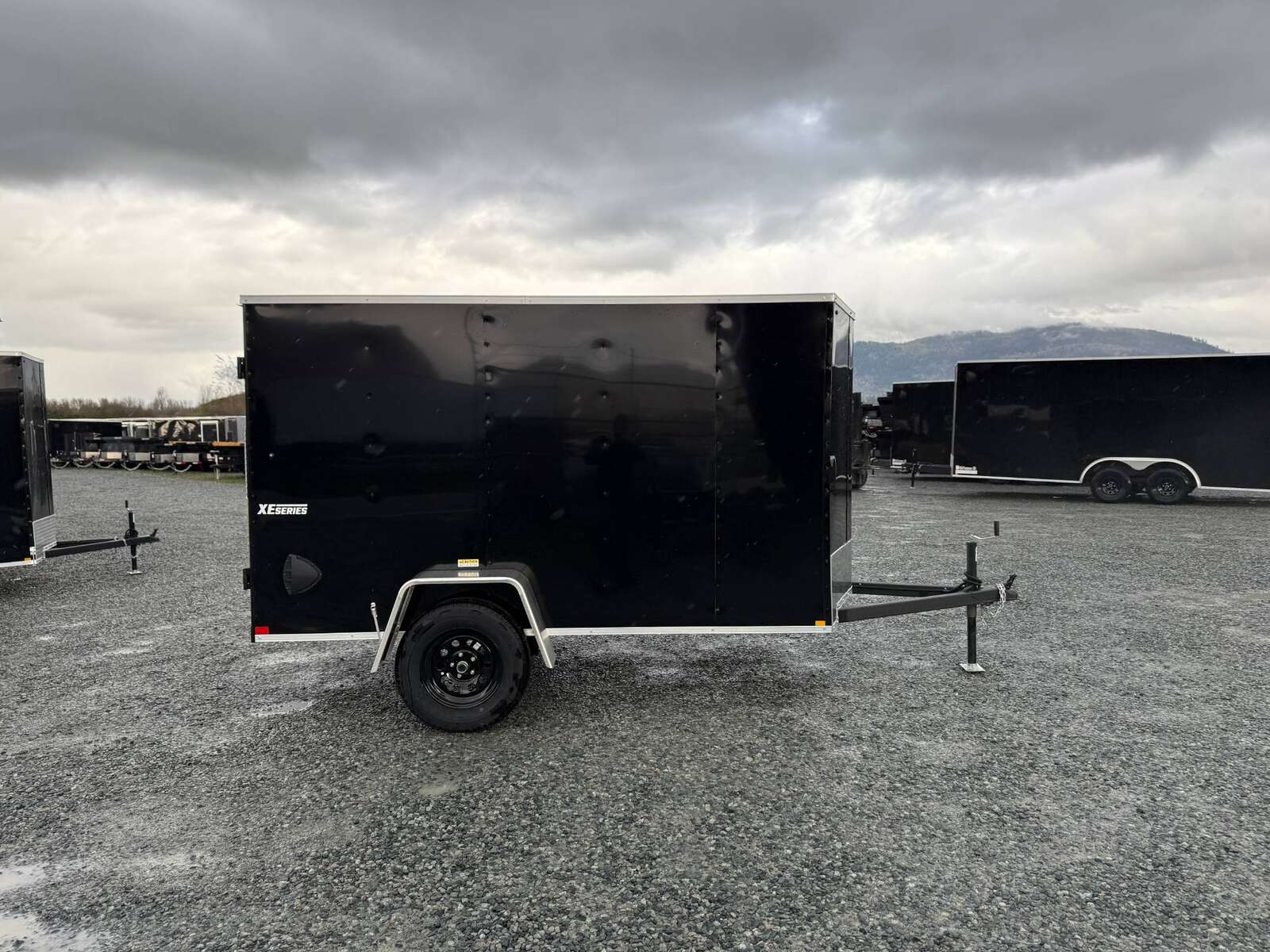 Photo of 2025 Mirage XE 5x10 V Nose Cargo / Enclosed Trailer Black Barn Door 2990lb GVW