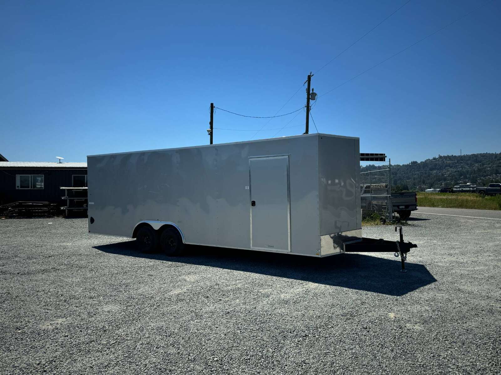 Photo of 2025 Mirage XE 8.5x24 V Nose Cargo / Enclosed Trailer Extra Height Ramp Door Silver 9900lb GVW