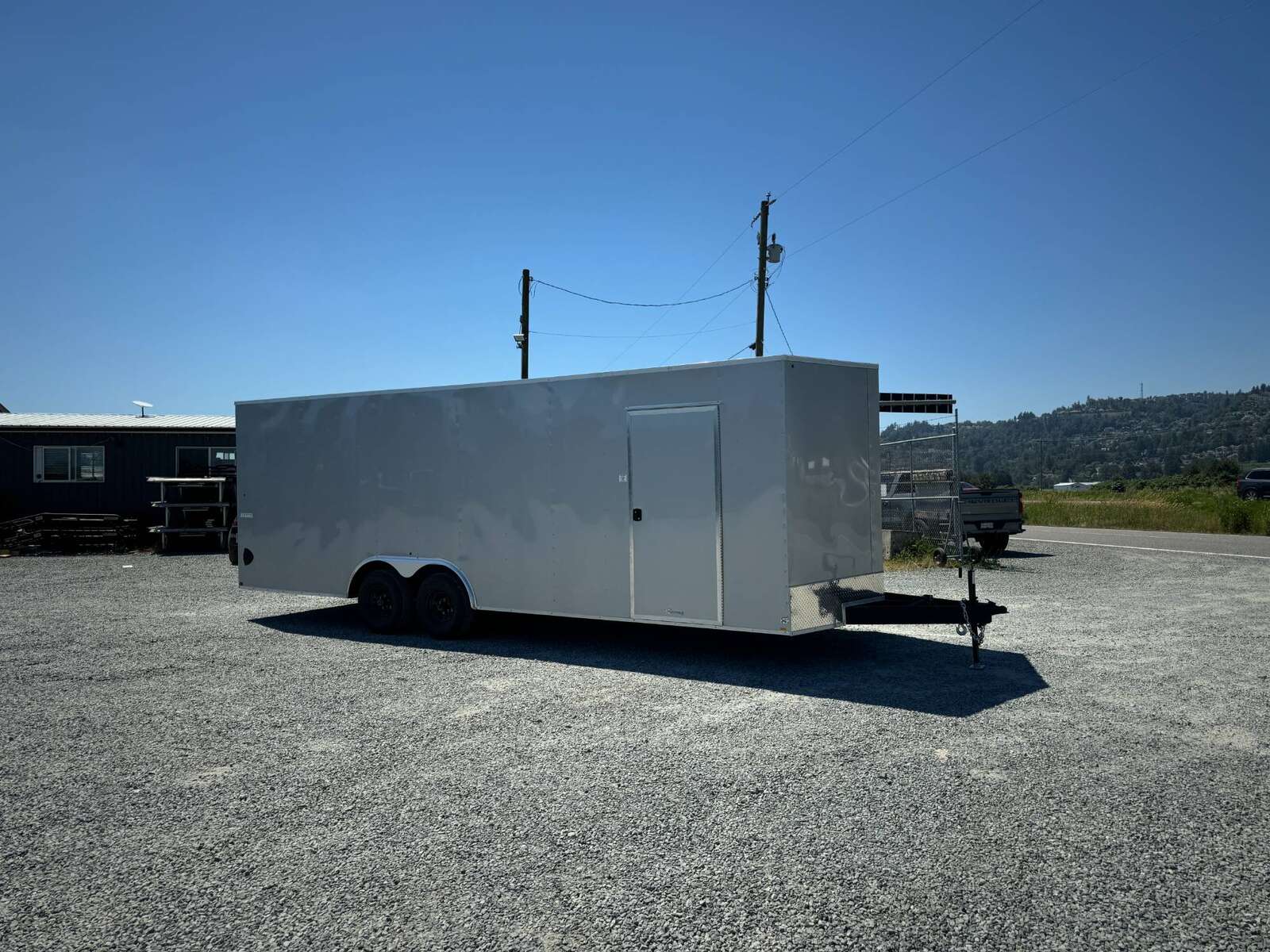 Photo of 2025 Mirage XE 8.5x24 V Nose Cargo / Enclosed Trailer Extra Height Ramp Door Silver 9900lb GVW