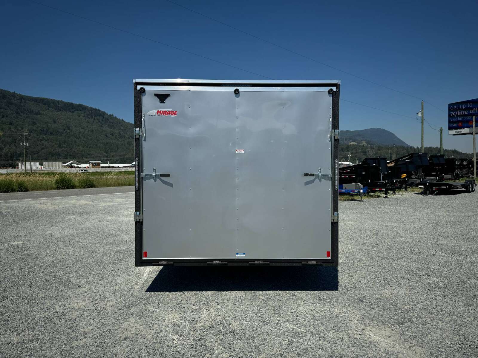 Photo of 2025 Mirage XE 8.5x24 V Nose Cargo / Enclosed Trailer Extra Height Ramp Door Silver 9900lb GVW