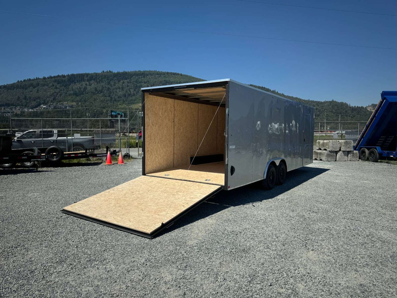 Photo of 2025 Mirage XE 8.5x24 V Nose Cargo / Enclosed Trailer Extra Height Ramp Door Silver 9900lb GVW