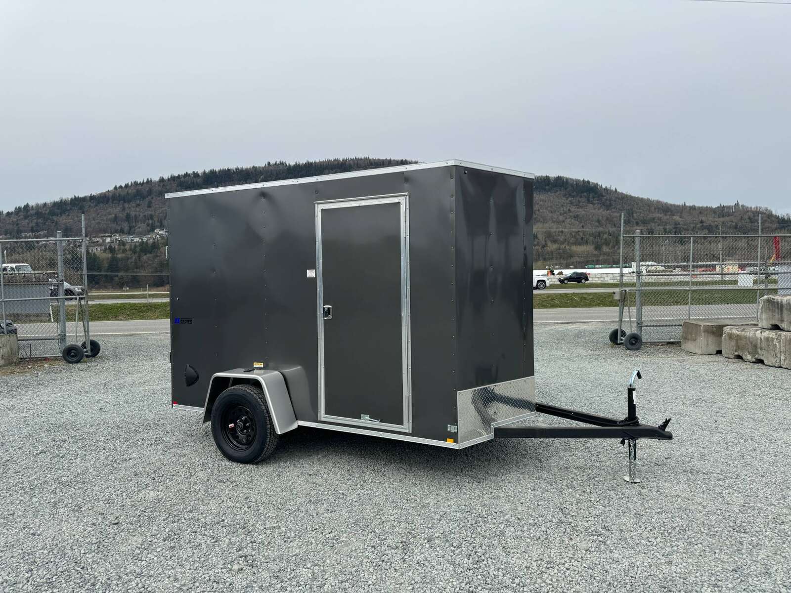 Photo of 2025 Mirage XE 6x10 V Nose Enclosed Cargo Trailer Ramp Door Charcoal Grey Extra Height 2990lb GVW