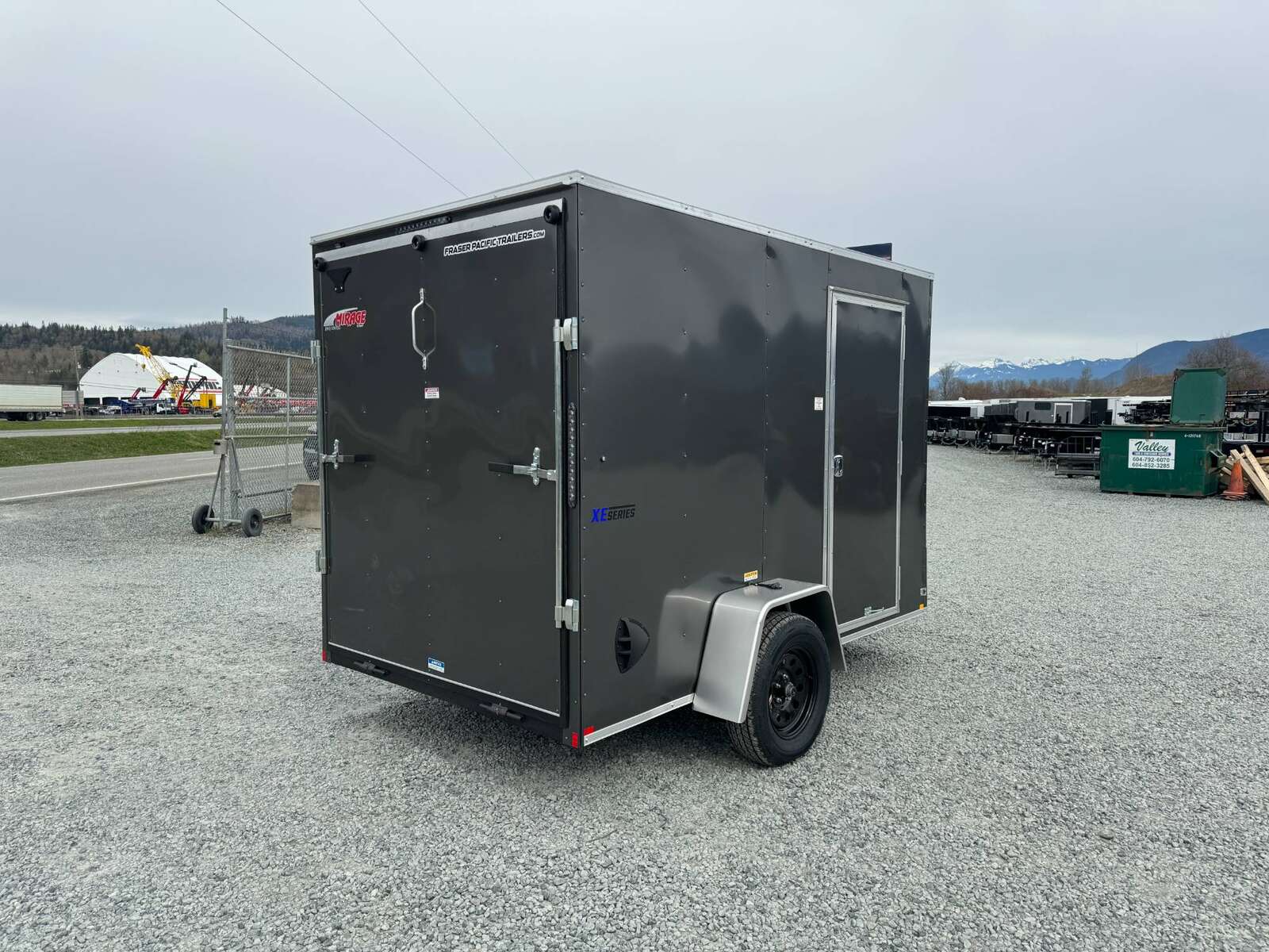 Photo of 2025 Mirage XE 6x10 V Nose Enclosed Cargo Trailer Ramp Door Charcoal Grey Extra Height 2990lb GVW