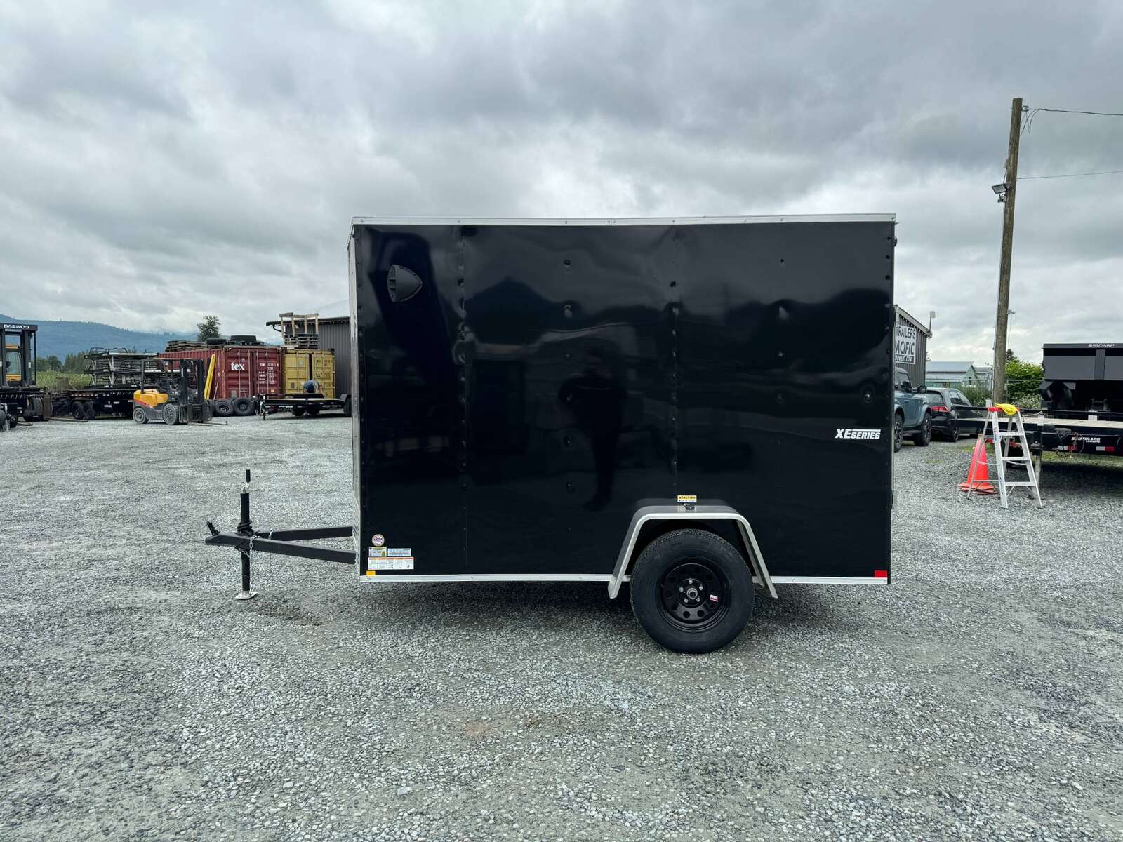 Photo of 2025 Mirage XE 6x10 V Nose Enclosed Cargo Trailer Ramp Door Black Extra Height 2990lb GVW