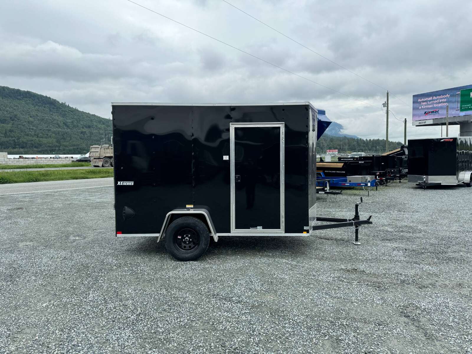 Photo of 2025 Mirage XE 6x10 V Nose Enclosed Cargo Trailer Ramp Door Black Extra Height 2990lb GVW