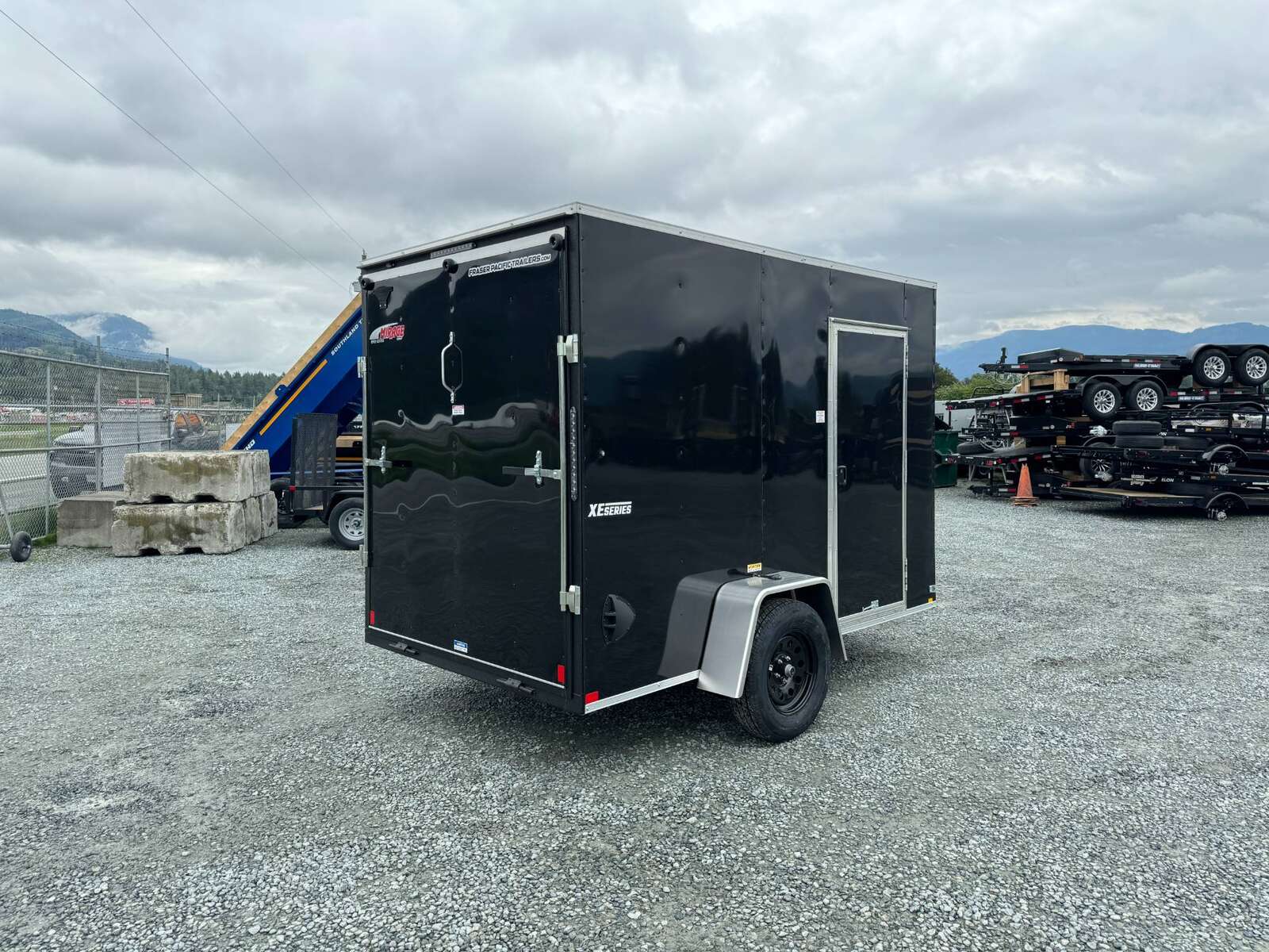 Photo of 2025 Mirage XE 6x10 V Nose Enclosed Cargo Trailer Ramp Door Black Extra Height 2990lb GVW