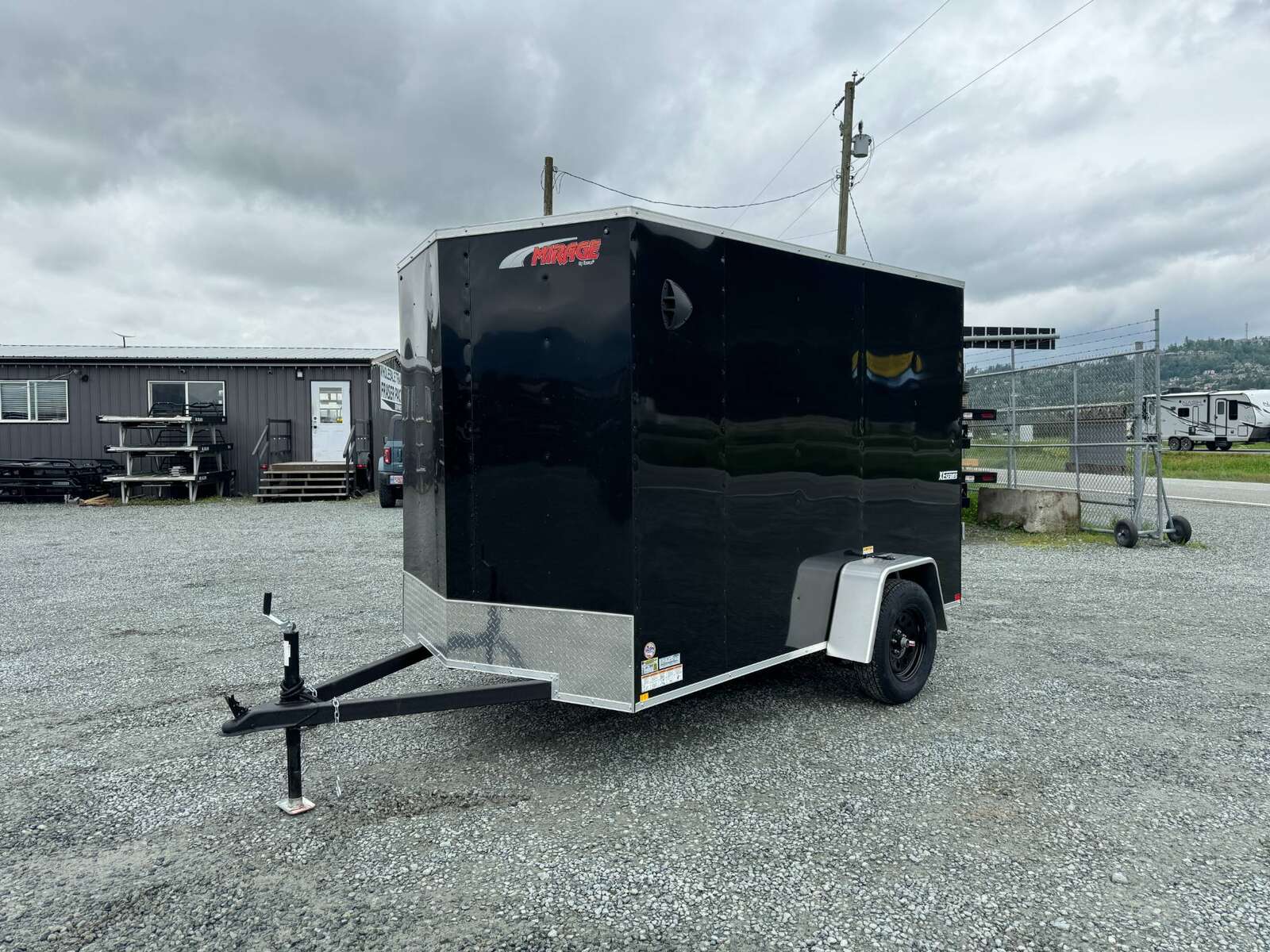 Photo of 2025 Mirage XE 6x10 V Nose Enclosed Cargo Trailer Ramp Door Black Extra Height 2990lb GVW