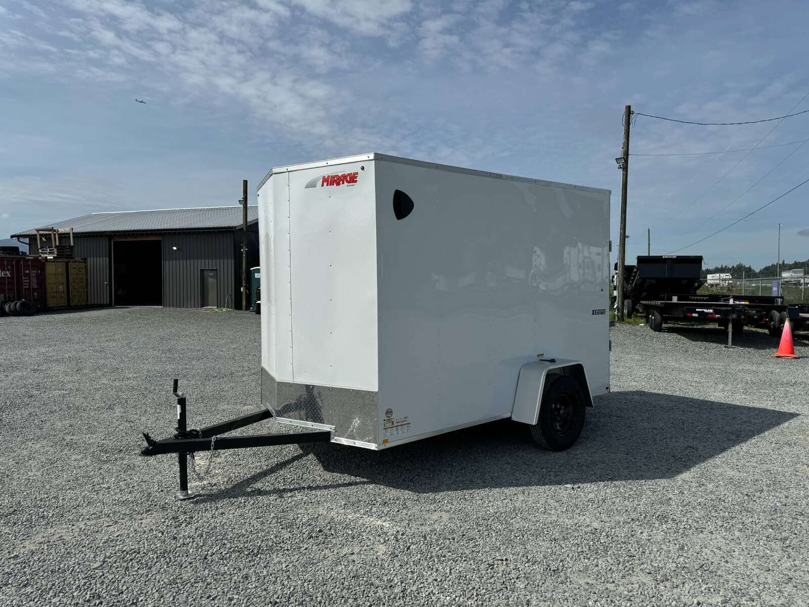 Photo of 2025 Mirage XE 6x10 V Nose Enclosed Cargo Trailer Ramp Door White Extra Height 2990lb GVW