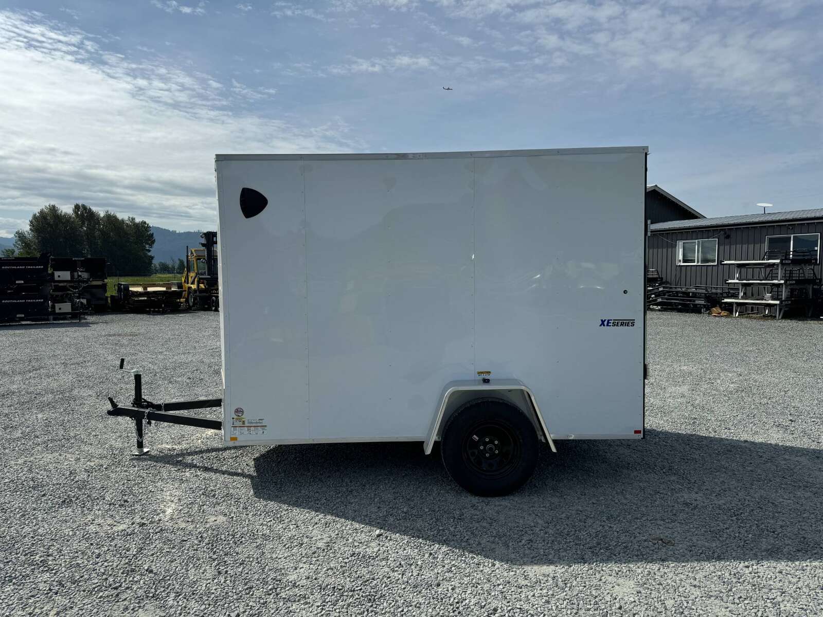 Photo of 2025 Mirage XE 6x10 V Nose Enclosed Cargo Trailer Ramp Door White Extra Height 2990lb GVW