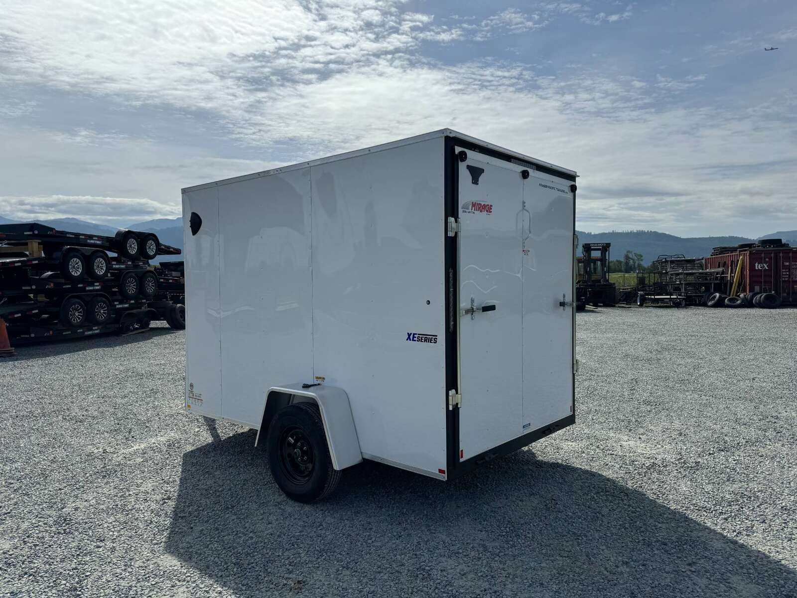 Photo of 2025 Mirage XE 6x10 V Nose Enclosed Cargo Trailer Ramp Door White Extra Height 2990lb GVW