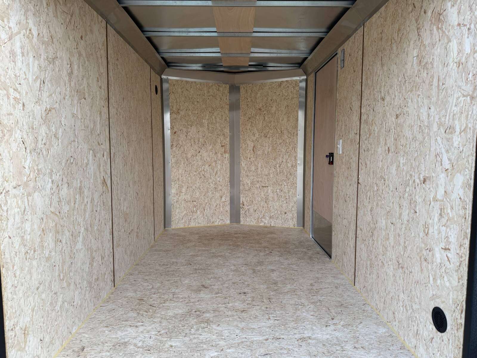 Photo of 2025 Mirage XE 6x10 V Nose Enclosed Cargo Trailer Barn Doors Charcoal Grey Extra Height 2990lb GVW