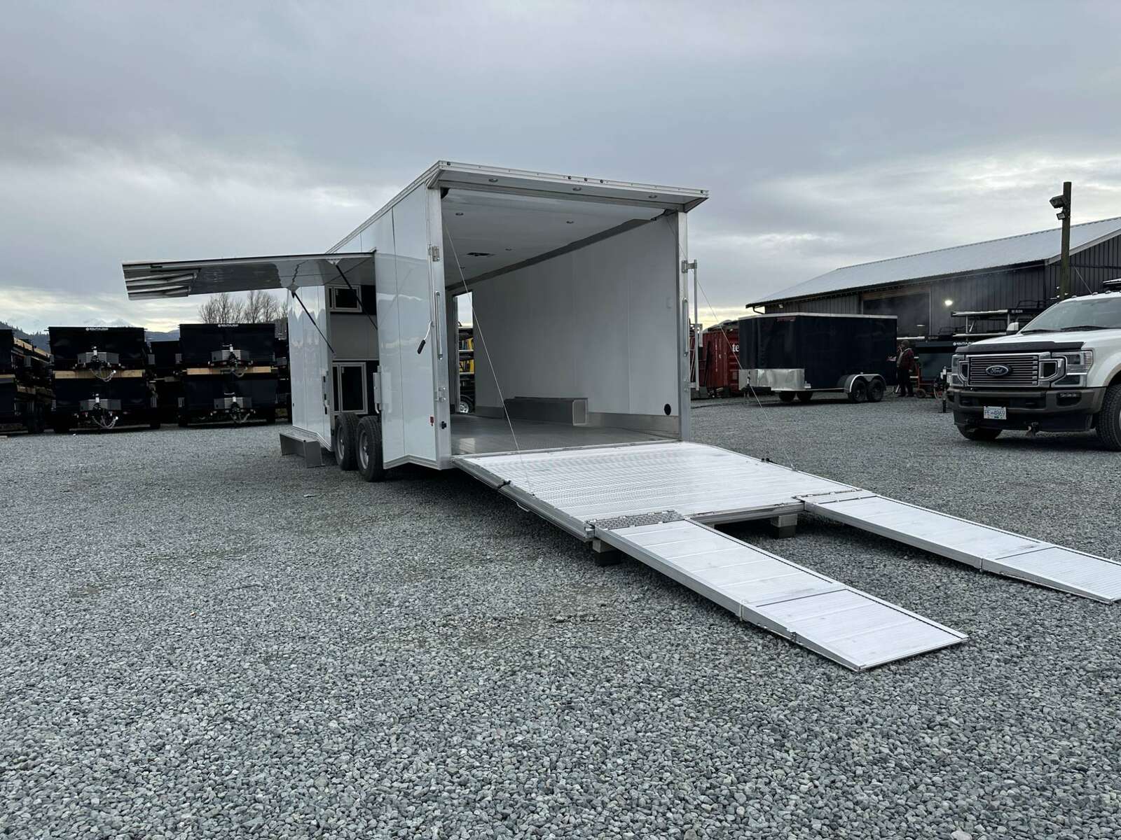 Photo of 2025 ALCOM ALUMINUM 8.5x24 CAR TRAILER 9900lb GVW WHITE LARGE ESCAPE SIDE DOOR