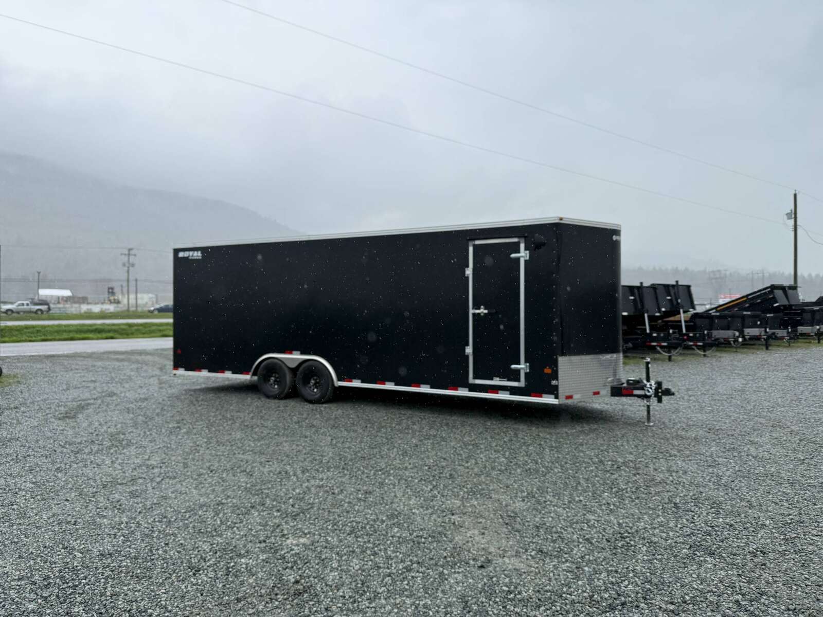 Photo of 2025 Royal Cargo 8.5x24 V Nose Car Hauler Cargo / Enclosed Trailer 11,400lb GVW Black Ramp Door Extra Height