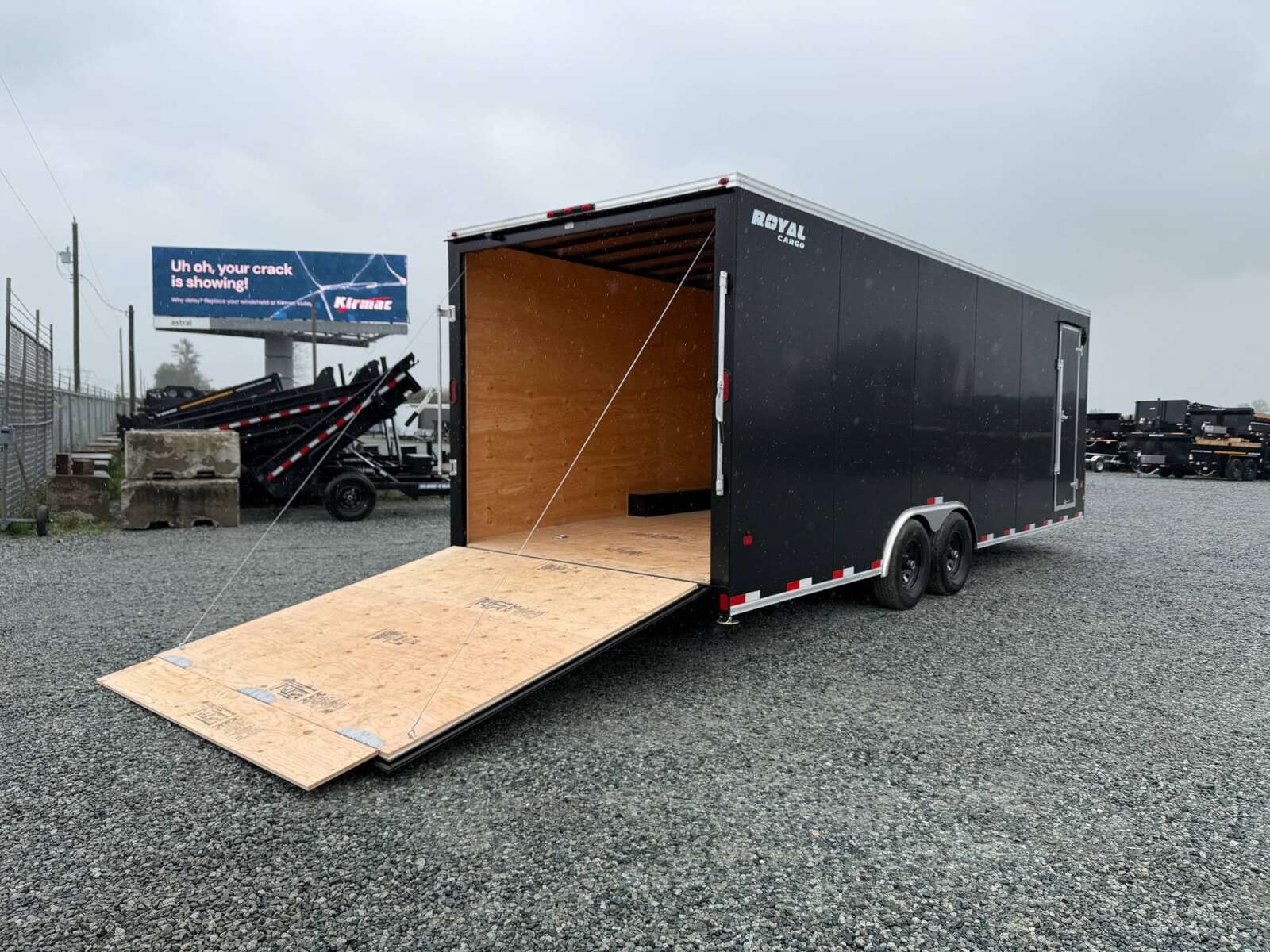 Photo of 2025 Royal Cargo 8.5x24 V Nose Car Hauler Cargo / Enclosed Trailer 11,400lb GVW Black Ramp Door Extra Height