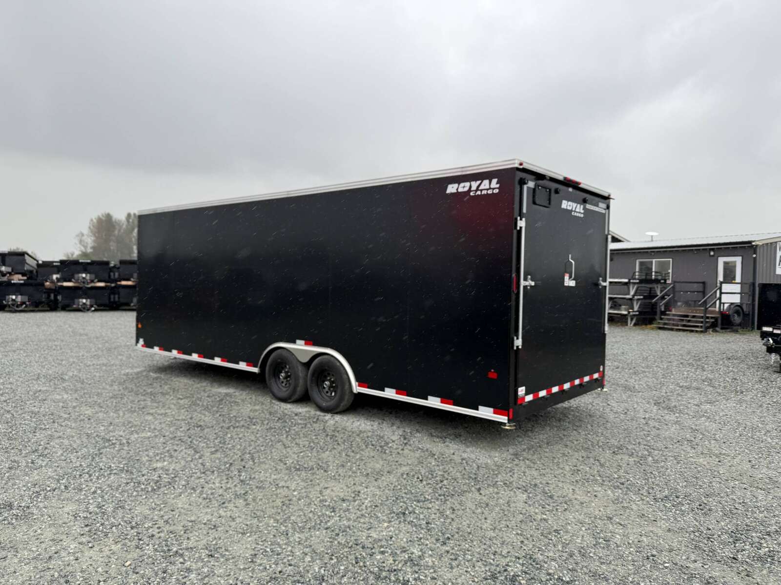 Photo of 2025 Royal Cargo 8.5x24 V Nose Car Hauler Cargo / Enclosed Trailer 11,400lb GVW Black Ramp Door Extra Height