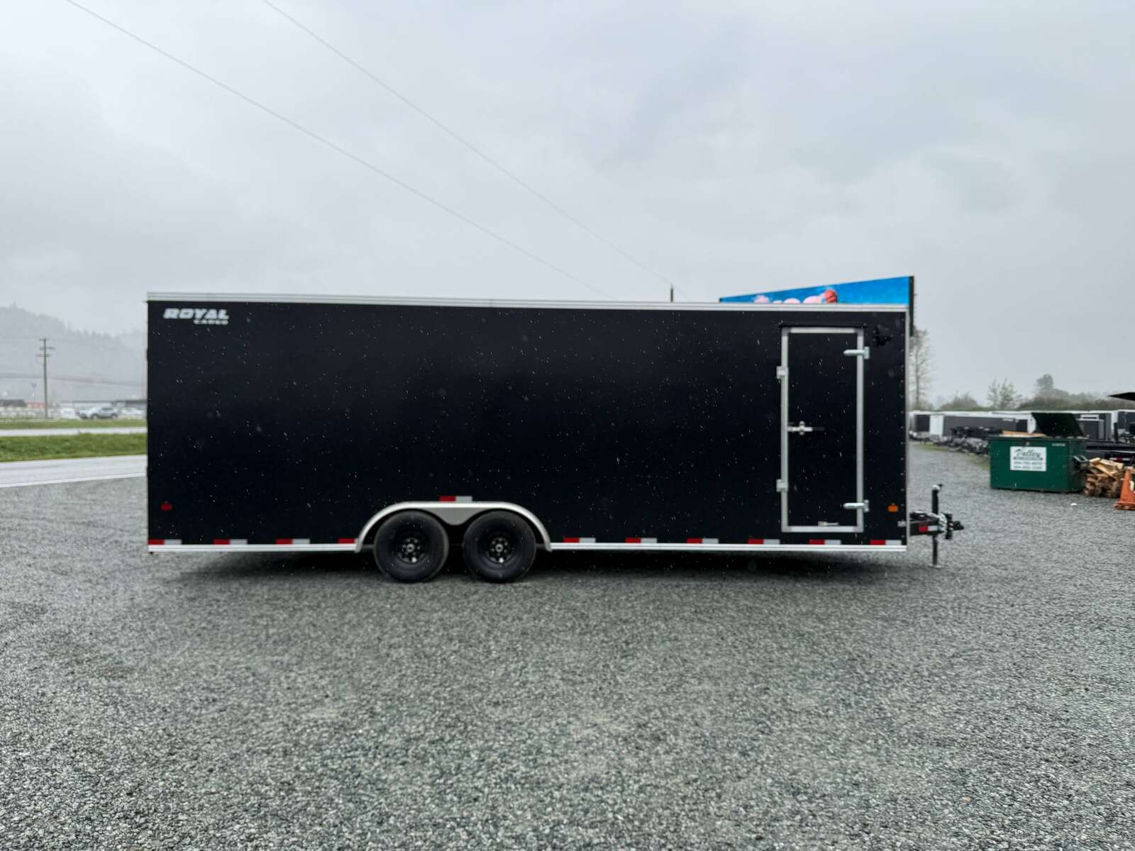 Photo of 2025 Royal Cargo 8.5x24 V Nose Car Hauler Cargo / Enclosed Trailer 11,400lb GVW Black Ramp Door Extra Height