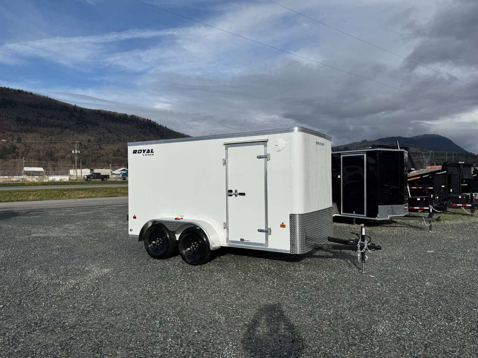 Photo of 2025 Royal Cargo 6x12 Tandem Axle Cargo / Enclosed Trailer Flat Front White Rear Barn Doors 7700lb GVW