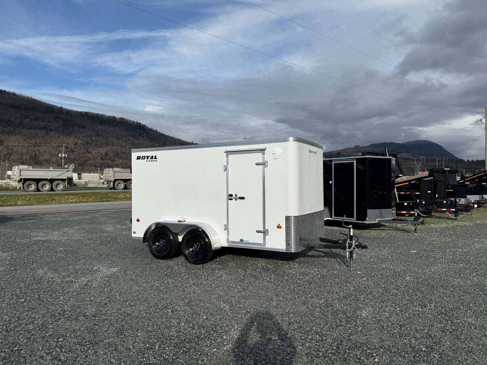 Photo of 2025 Royal Cargo 6x12 Tandem Axle Cargo / Enclosed Trailer Flat Front White Rear Barn Doors 7700lb GVW