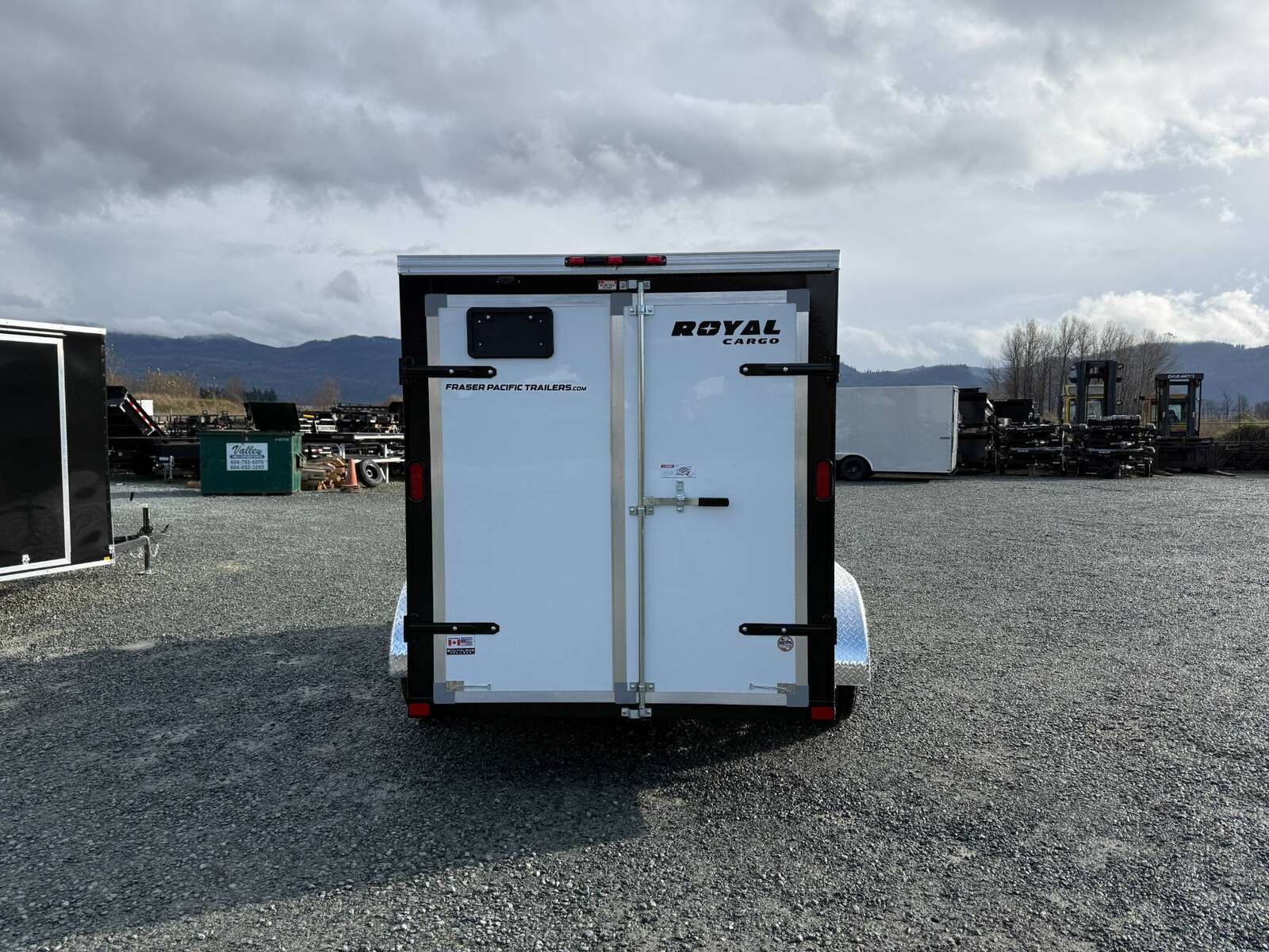 Photo of 2025 Royal Cargo 6x12 Tandem Axle Cargo / Enclosed Trailer Flat Front White Rear Barn Doors 7700lb GVW