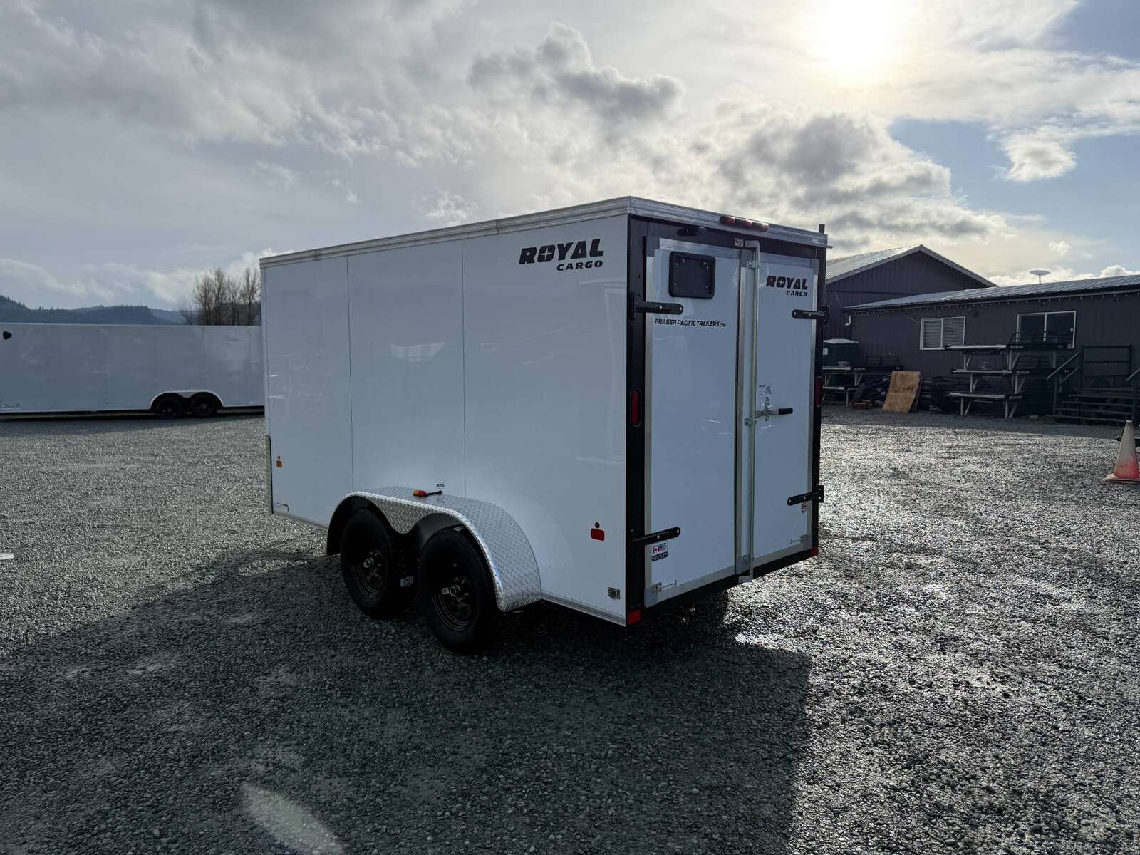 Photo of 2025 Royal Cargo 6x12 Tandem Axle Cargo / Enclosed Trailer Flat Front White Rear Barn Doors 7700lb GVW