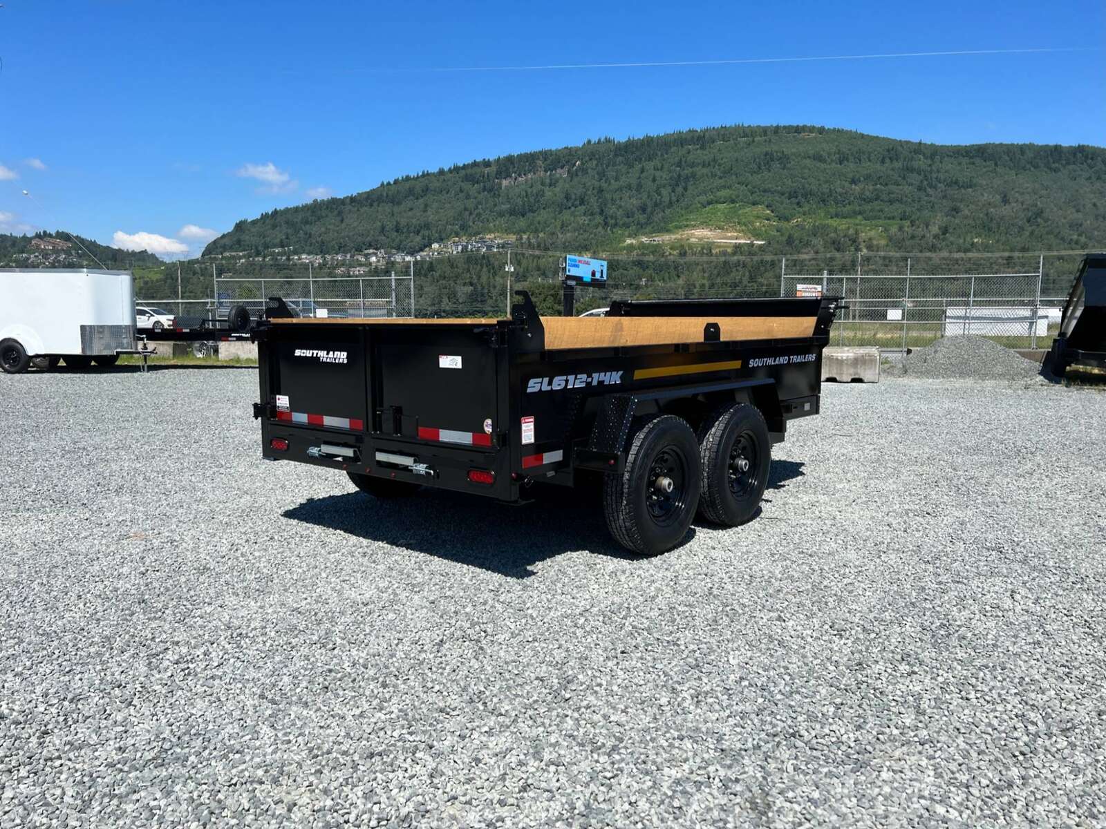 Photo of 2025 Southland 6X12 Dump Trailer 15,400LB Heavy Duty with Tarp & Ramps