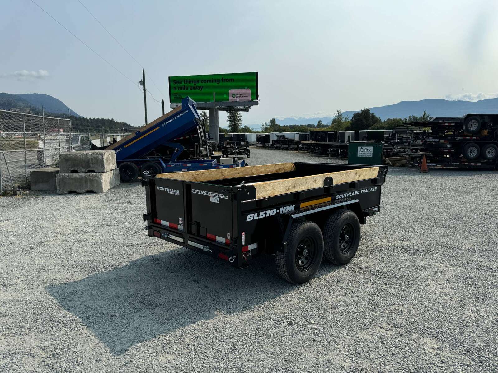 Photo of 2025 Southland 5x10 Dump Trailer 11,464lbs GVW Black w/ Tarp & Ramps