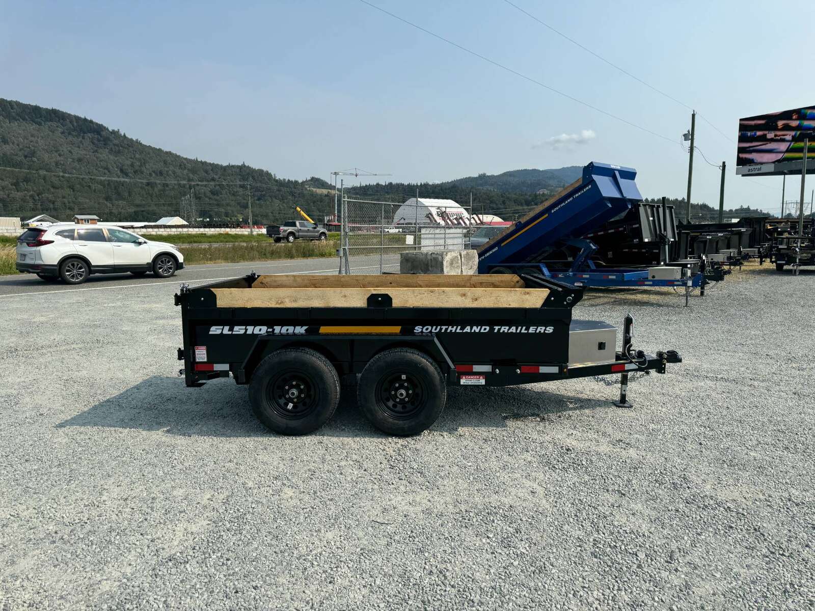 Photo of 2025 Southland 5x10 Dump Trailer 11,464lbs GVW Black w/ Tarp & Ramps