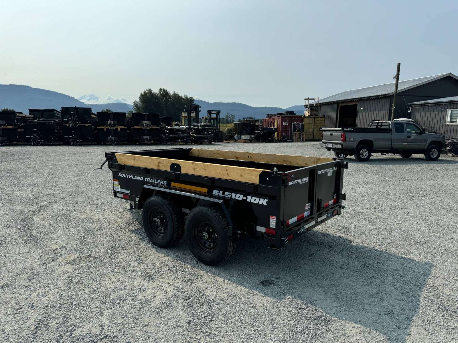 Photo of 2025 Southland 5x10 Dump Trailer 11,464lbs GVW Black w/ Tarp & Ramps