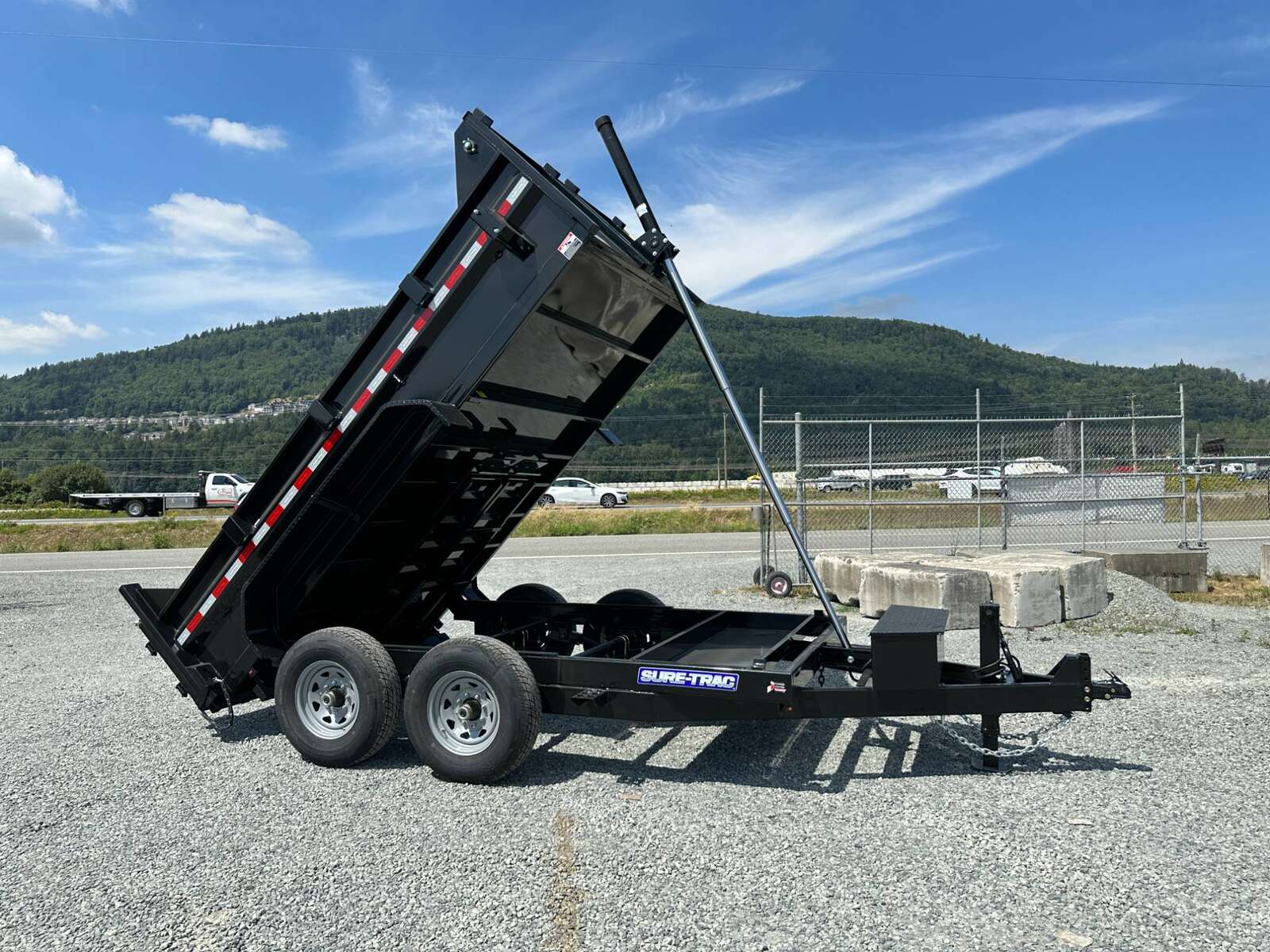 Photo of New SureTrac 7x12 Telescopic Hoist Dump Trailer 14,000lbs GVW w/ Ramps and Tarp