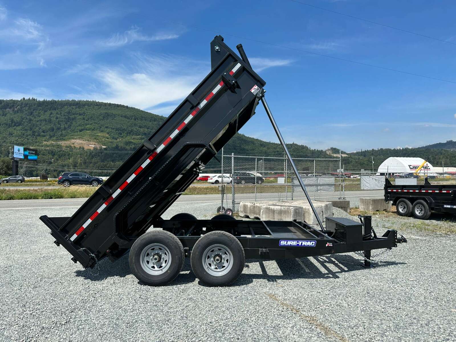 Photo of New SureTrac 7x12 Telescopic Hoist Dump Trailer 14,000lbs GVW w/ Ramps and Tarp