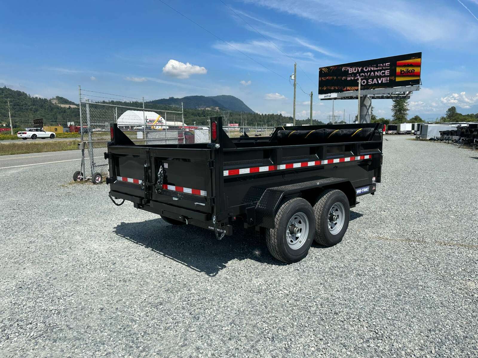 Photo of New SureTrac 7x12 Telescopic Hoist Dump Trailer 14,000lbs GVW w/ Ramps and Tarp