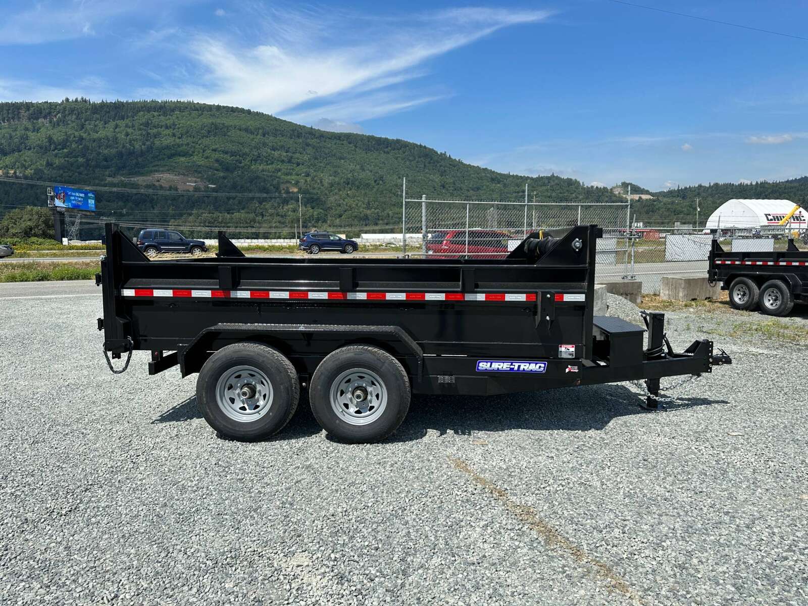 Photo of New SureTrac 7x12 Telescopic Hoist Dump Trailer 14,000lbs GVW w/ Ramps and Tarp