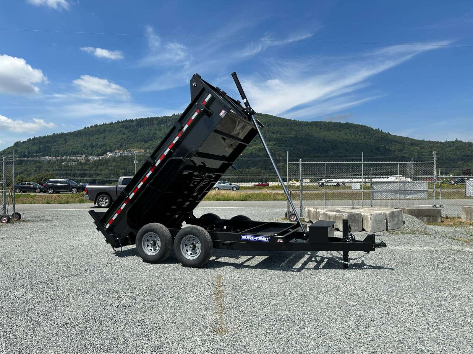 Photo of New SureTrac 7x12 Telescopic Hoist Dump Trailer 14,000lbs GVW w/ Ramps and Tarp