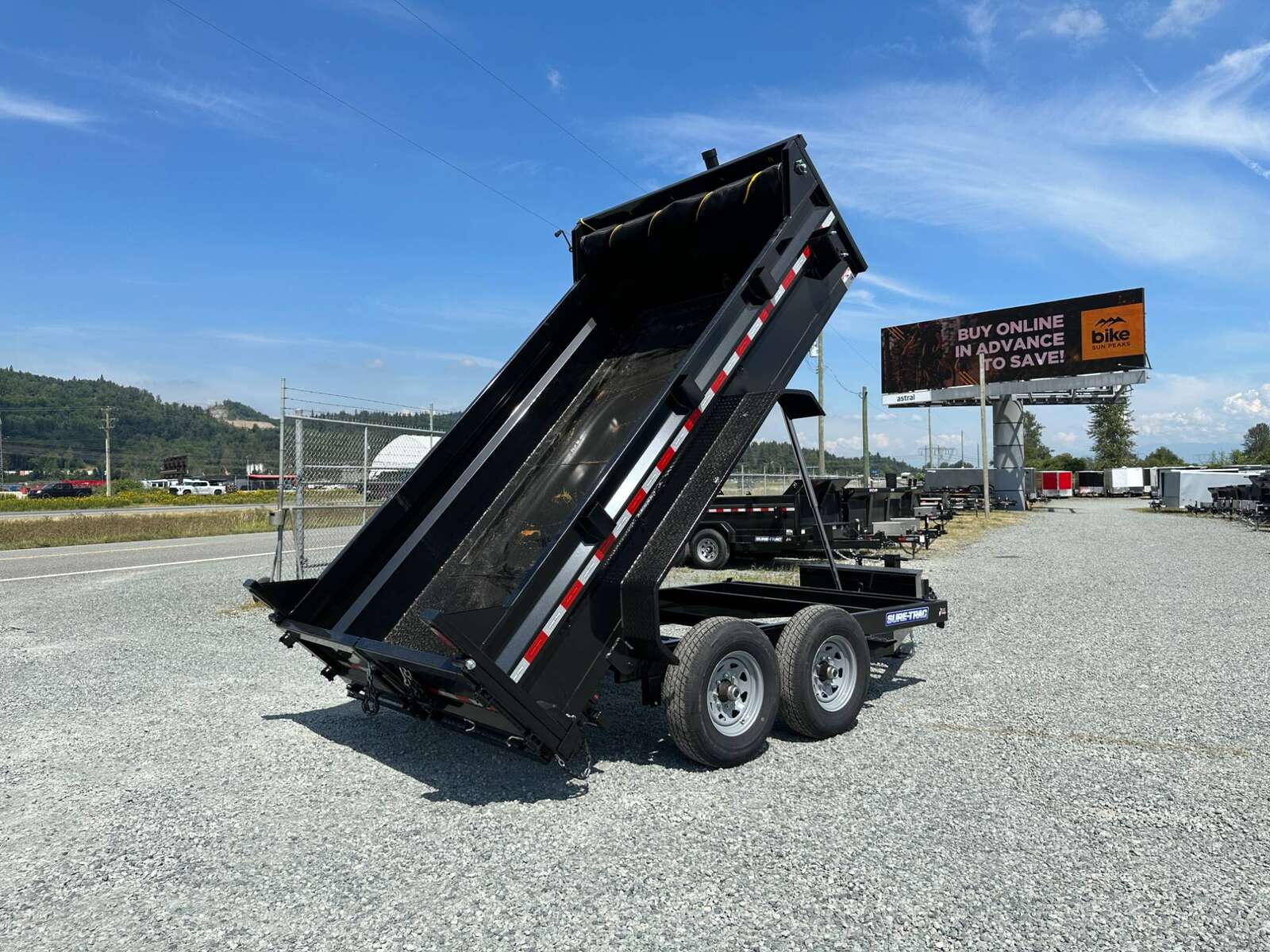 Photo of New SureTrac 7x12 Telescopic Hoist Dump Trailer 14,000lbs GVW w/ Ramps and Tarp