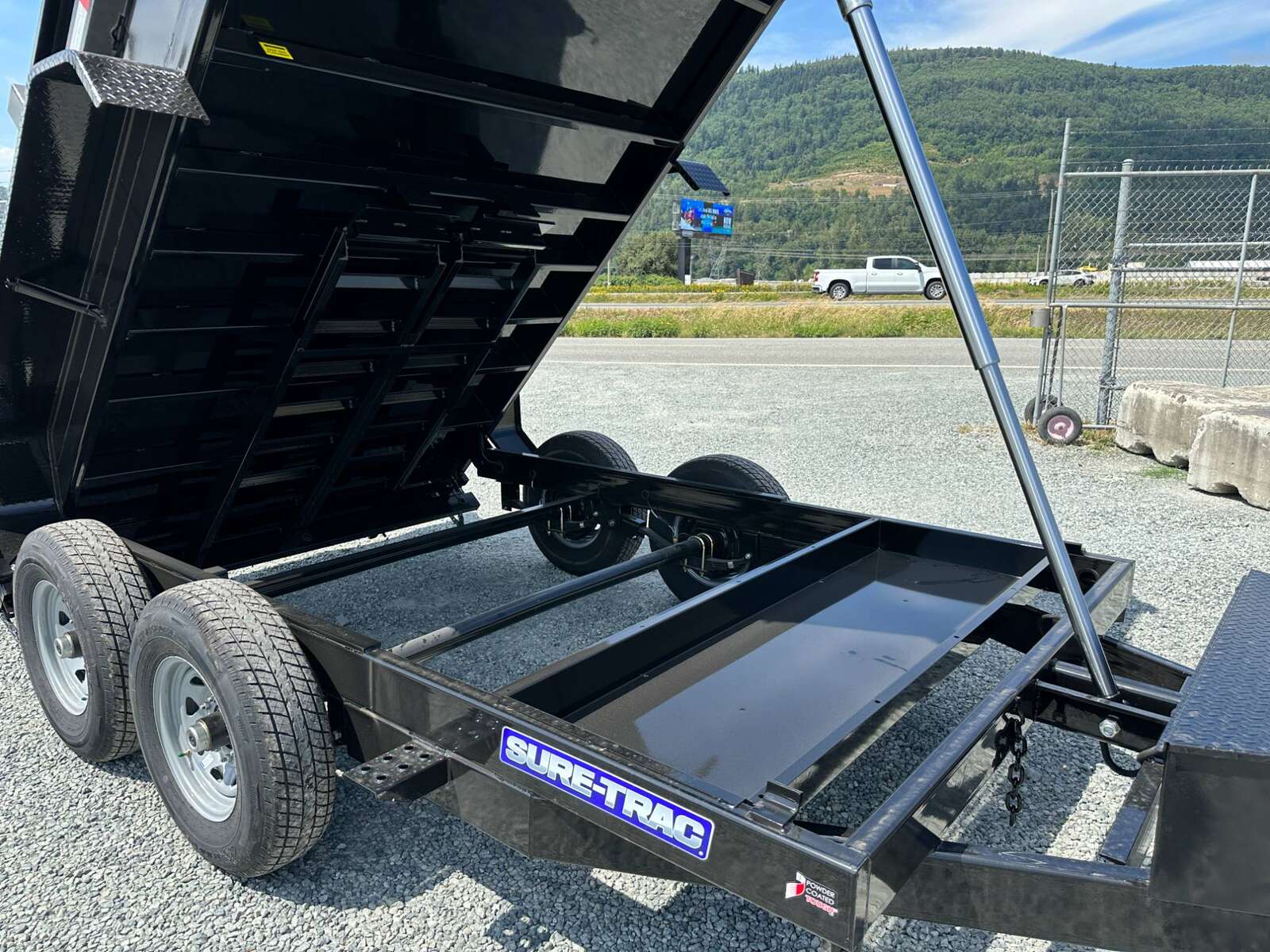 Photo of New SureTrac 7x12 Telescopic Hoist Dump Trailer 14,000lbs GVW w/ Ramps and Tarp