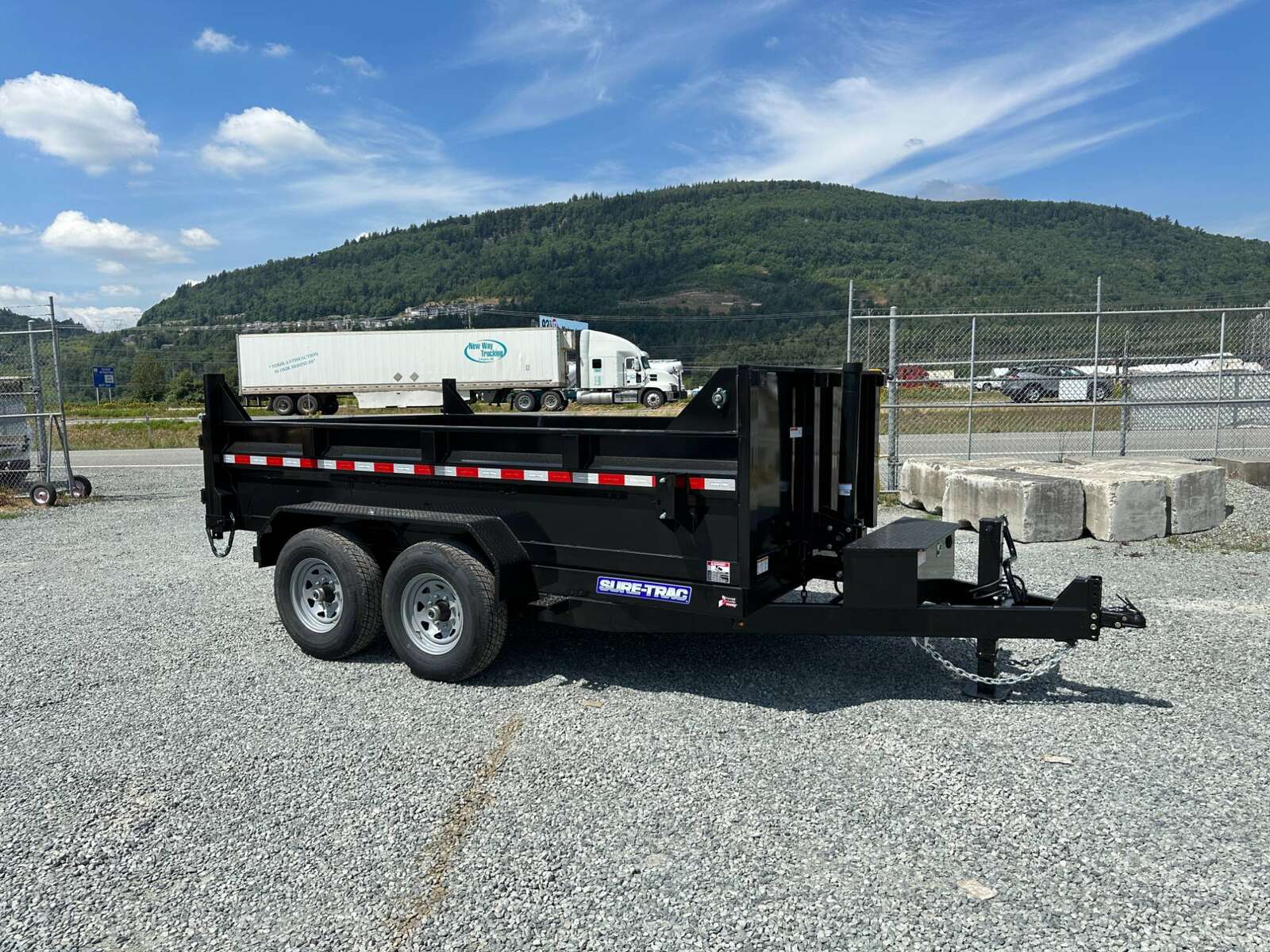 Photo of New SureTrac 7x12 Telescopic Hoist Dump Trailer 14,000lbs GVW w/ Ramps and Tarp