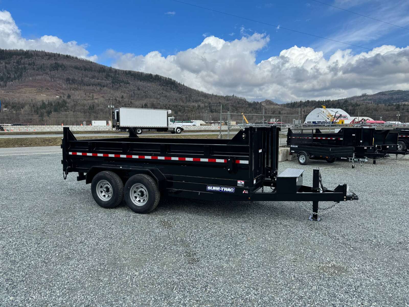 Photo of New SureTrac 7x14 Telescopic Hoist Dump Trailer 14,000lbs GVW w/ Ramps and Tarp