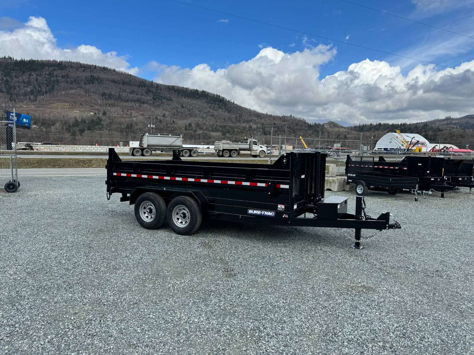 Photo of New SureTrac 7x14 Telescopic Hoist Dump Trailer 14,000lbs GVW w/ Ramps and Tarp