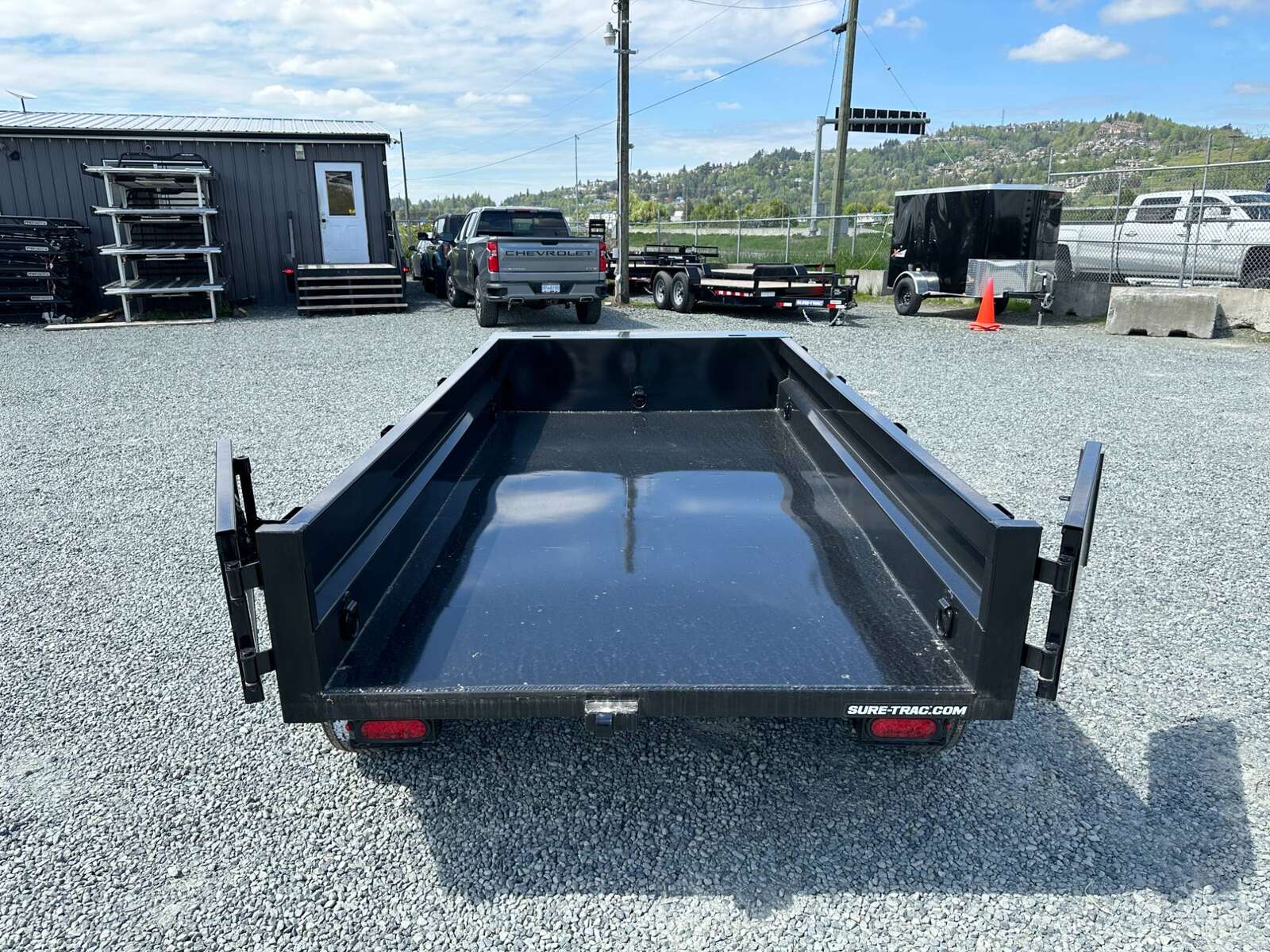 Photo of 2024 Suretrac 5x10 Dump Trailer 7000lb GVW Barn Doors