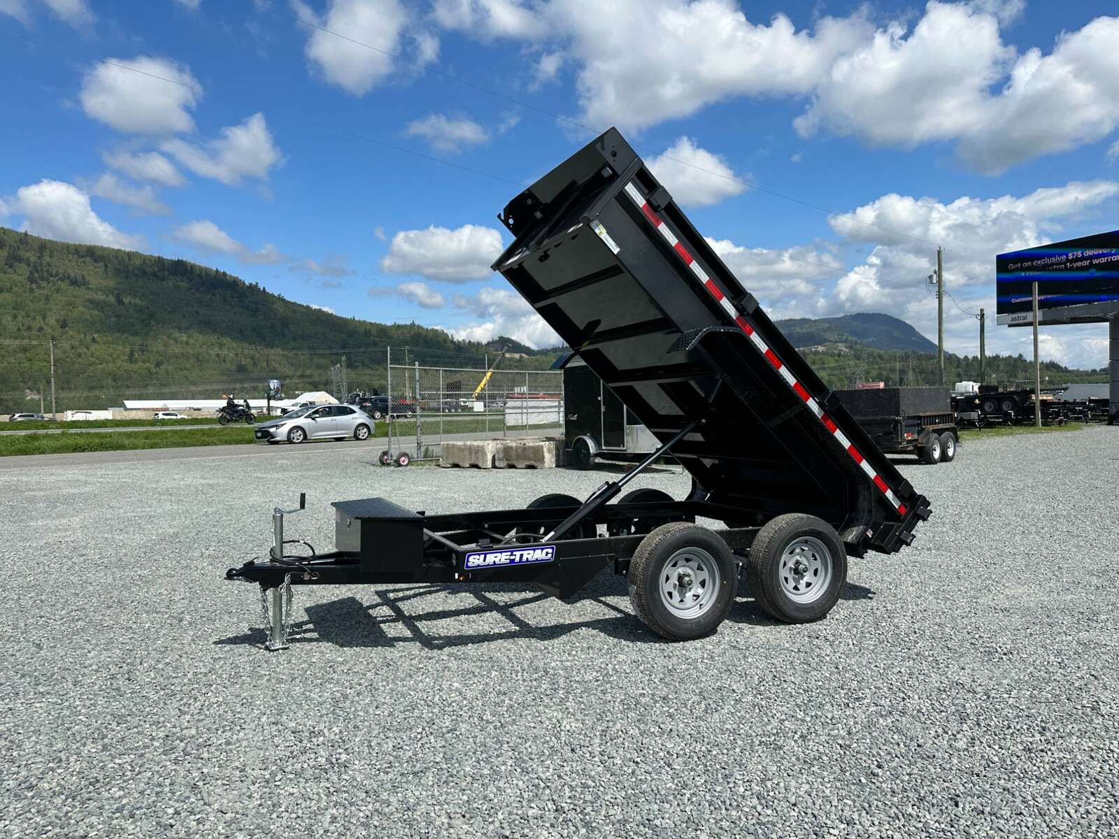 Photo of 2024 Suretrac 5x10 Dump Trailer 7000lb GVW Barn Doors