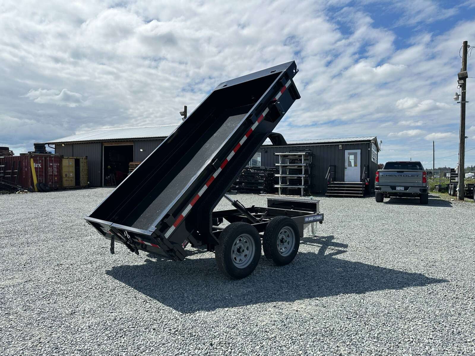 Photo of 2024 Suretrac 5x10 Dump Trailer 7000lb GVW Barn Doors